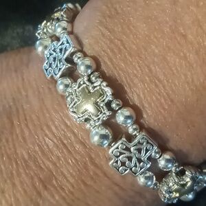 Metal beaded expandable bracelet silver crosses with gold wash inlay.